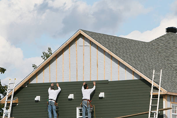 Professional Emergency Siding Repair technician working in Walnut Bottom, PA